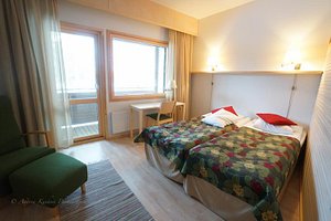 Tradition Hotel Kultahovi in Inari, image may contain: Furniture, Chair, Bedroom, Indoors