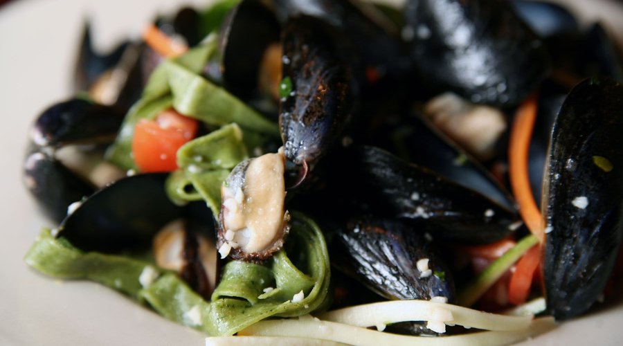Add pasta to our PEI steamed mussels with your choice of sauce. They are delicious!

