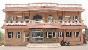 Hotel Poonam Palace in Ramdevra, image may contain: Hotel, City, Motorcycle, Urban