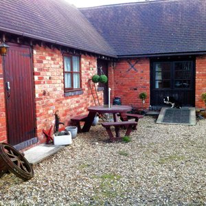 The farmhouse courtyard and reception.