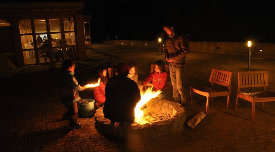 huddled around the bonfire
