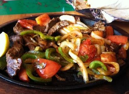 https://dynamic-media-cdn.tripadvisor.com/media/photo-o/03/be/34/bb/beef-fajitas.jpg?w=500&h=300&s=1