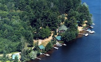 Charming log cabins just 6 - 20' from beautiful Lost Land Lake