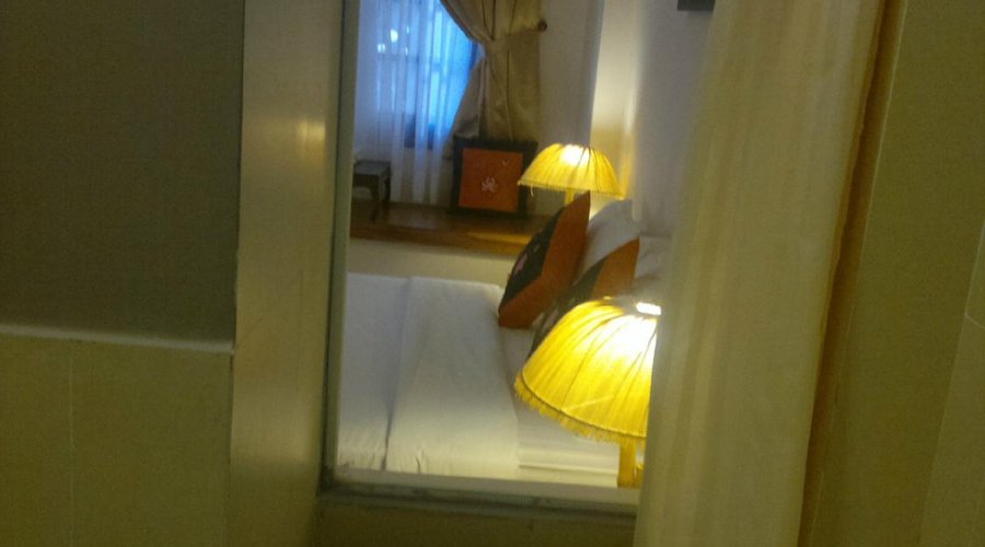 view from bathroom into your hotelroom