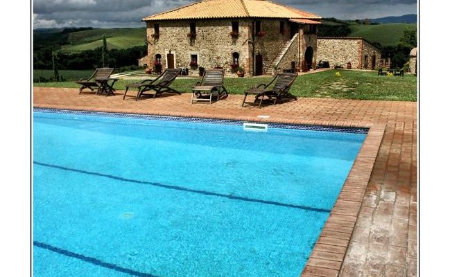 pool with the house behind