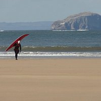 Surfer on Belhaven Beach