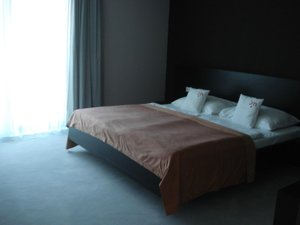 Hotel Magnus in Trencin, image may contain: Furniture, Bed, Bedroom, Room