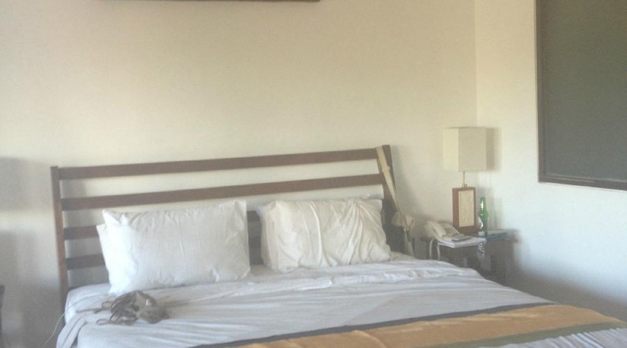 Light filled bedroom with weak aircon...
