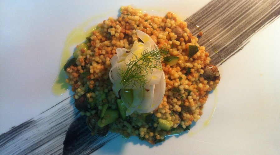 Fregola, sardinian pasta with clams and cuorgette puree