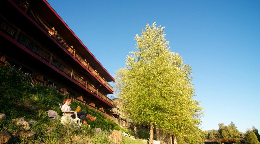 Enjoy a good book in our riverside picnic area