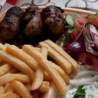 Seftalia with fries and salad