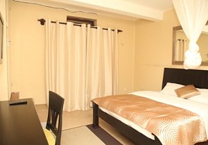 Single, self-contained bedroom at Kampala Premier Inn & Hostel