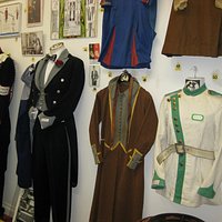 New display of old cinema uniforms from bygone days