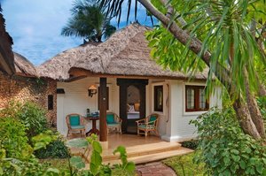 Poppies Bali in Kuta, image may contain: Resort, Hotel, Building, Hut