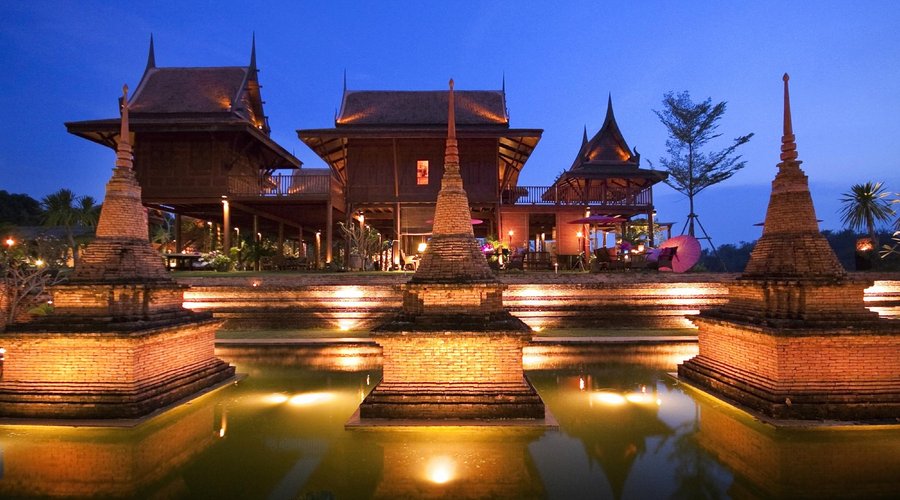 Chedi view with beautiful Thai Residence as backdrop