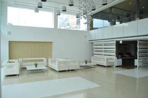 Icon Select By Bhagini in Bengaluru, image may contain: Living Room, Flooring, Floor, Reception Room