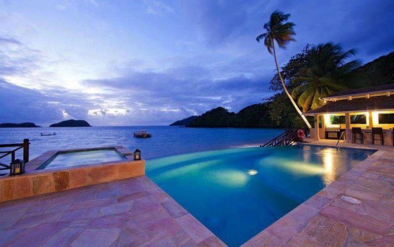 Pool deck and sea at sunset