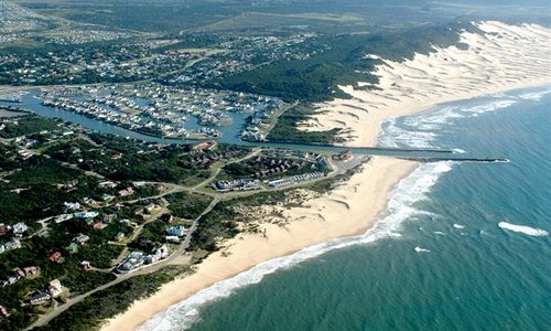 Cross the little road and walk our endless beaches.