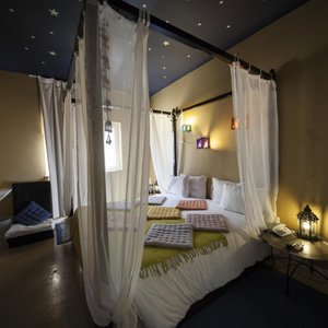 Hotel Made Inn in Portimao, image may contain: Corner, Interior Design, Painting, Person