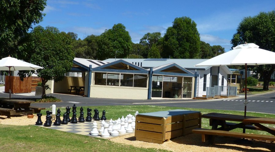 Chess, camper's kitchen & individual bathrooms.