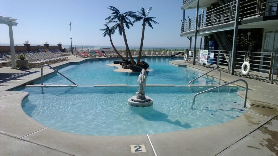 The pool at the Royal Hawaiian, looking out towards the ocean.  There is a separate hot tub behi