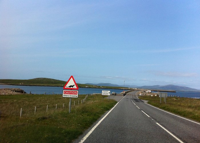 The causeway to Berneray Note  otters crossing sign.