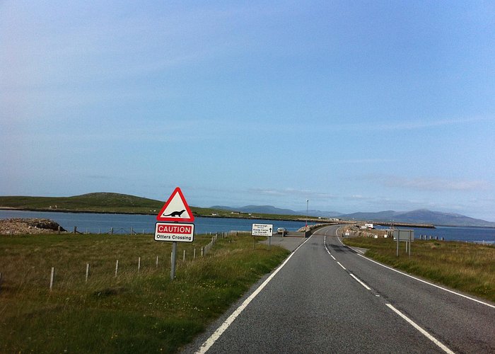 The causeway to Berneray Note  otters crossing sign.