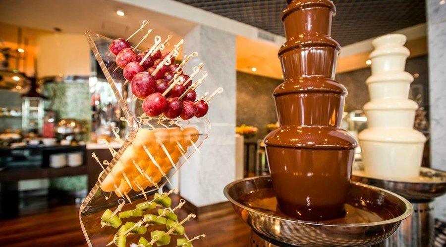 Chocolate Fondue with fresh fruits in dessert section