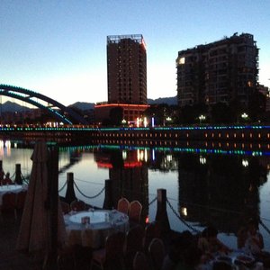 Hotel (left highrise) seen from across the river