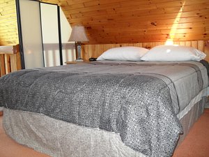 Paradis Motel, Sturgeon Falls in Cache Bay, image may contain: Interior Design, Bed, Furniture, Lamp