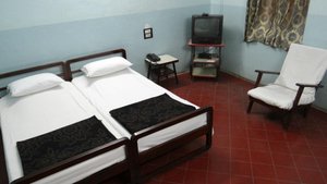 Mysore Dasprakash in Mysuru (Mysore), image may contain: Chair, Furniture, Bed, Monitor