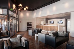 Ruka Ski Chalets in Rukatunturi, image may contain: Chandelier, Living Room, Couch, Dining Room