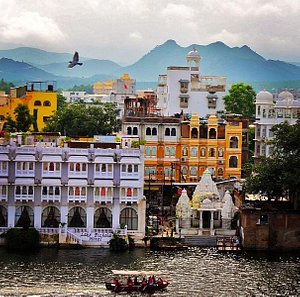 Mewar Haveli in Udaipur, image may contain: Boat, Vehicle, Cityscape, Bird