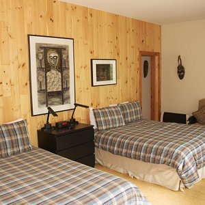 Chambre avec 2 grands lits  et grande terrasse