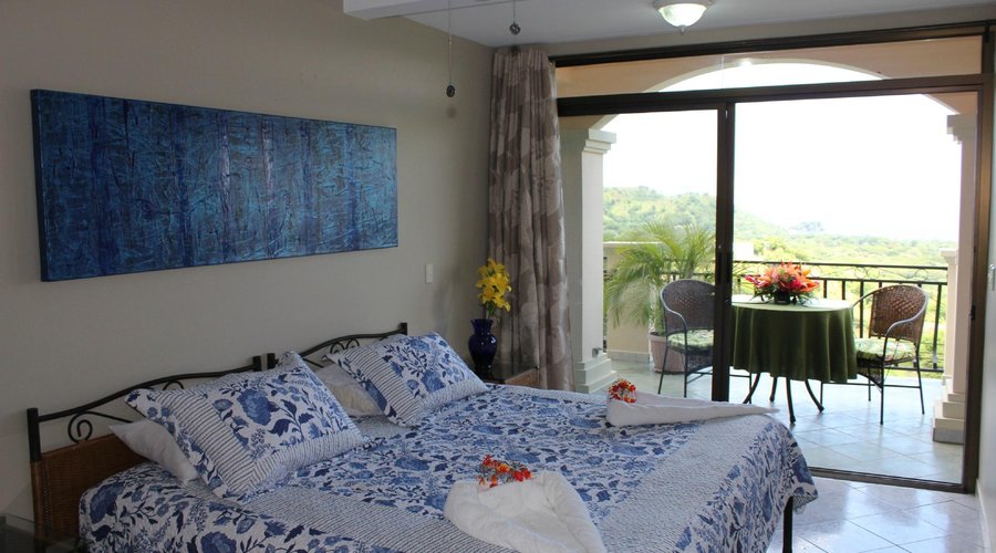 Bedroom with ocean view in one bedroom apartment