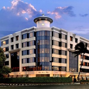 Hotel Marine Plaza in Mumbai, image may contain: Dining Room, Dining Table, Table, Restaurant