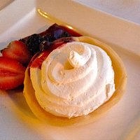 Lemon tart with chantilly cream and fresh fruit