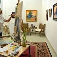 One of the studio artists, Trisha Adams, working in her studio.