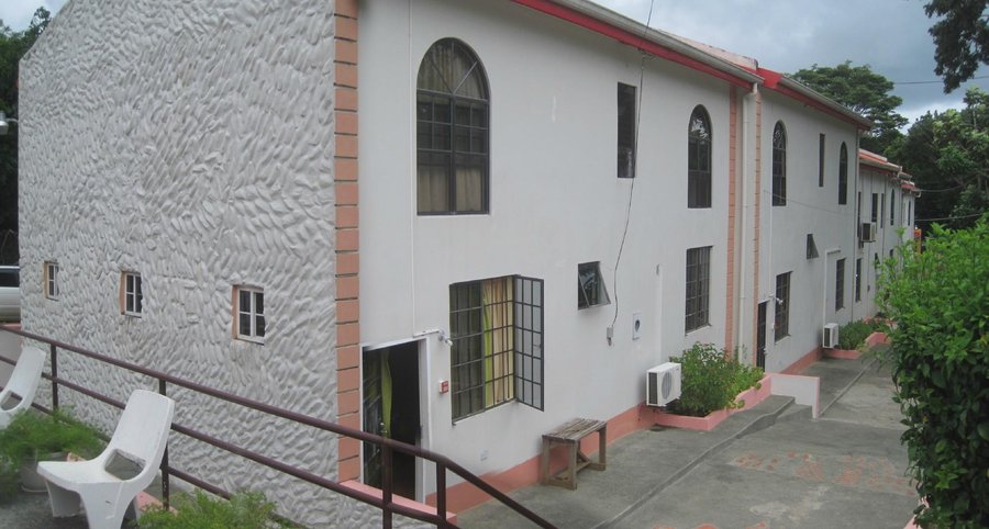 the back of the apartments when viewed form pool side