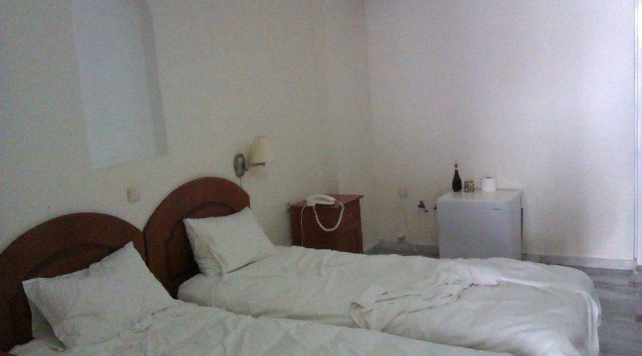 On the left the strange recess. Straight ahead the going-nowhere pipes and tiny fridge.