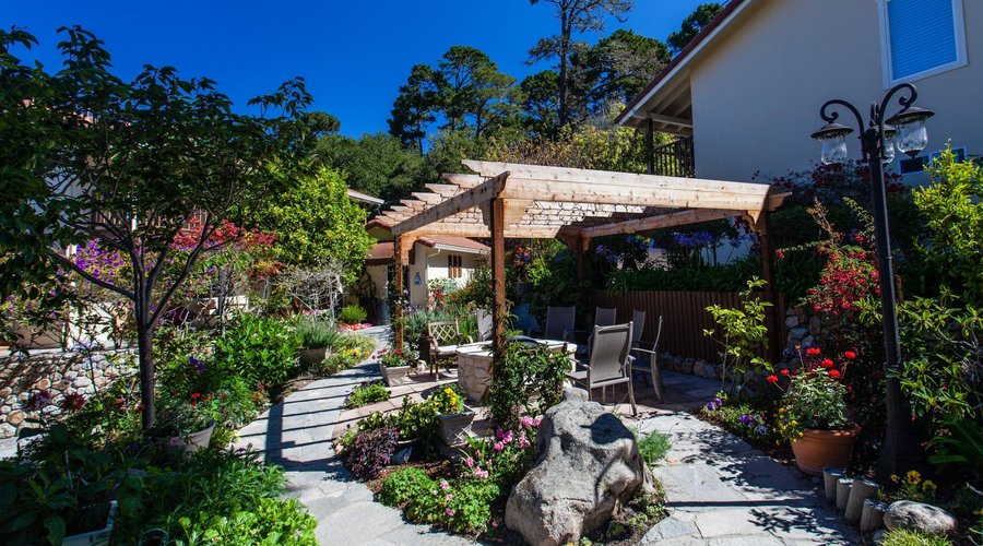 Pergola and Fire Pit Area with our Beautiful Garden