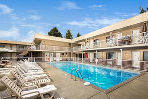 Siesta Suites in Kelowna, image may contain: Hotel, Resort, Villa, Pool