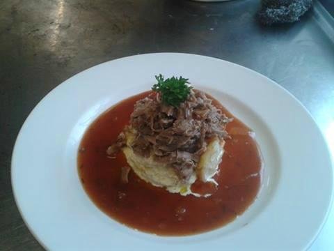 Shredded Shoulder of Welsh Lamb,with sliced garlic and cream potatoes