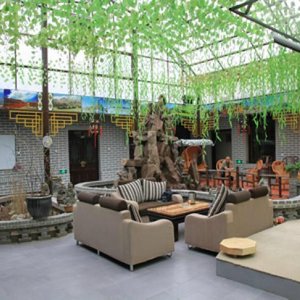 Covered courtyard turned to big cozy reception area.