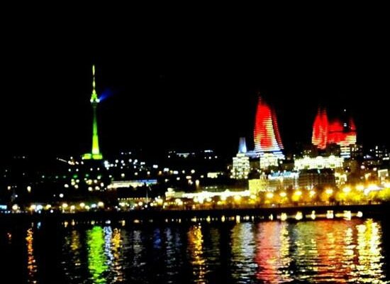 flame towers at night