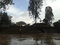 Koyna Dam: a) Picture of Koyna dam b) Typical NOF monolith section