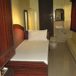 Hotel Sorrento Guest House in Chennai (Madras), image may contain: Neighborhood, Advertisement, City, Urban