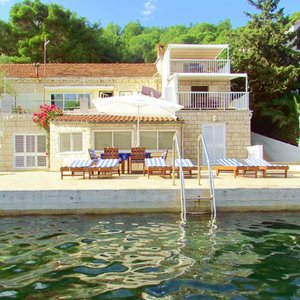View of waterfront villa from sea
