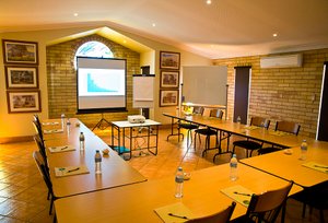 Starlight Motor Inn in Roma, image may contain: Indoors, People, Person, Meeting Room
