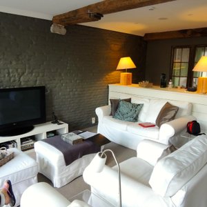 Comfy living room with bar in the back
